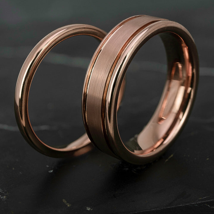 His and hers polished rose gold wedding bands in 2mm and 6mm widths, featuring a smooth high shine finish and matching minimalist design.